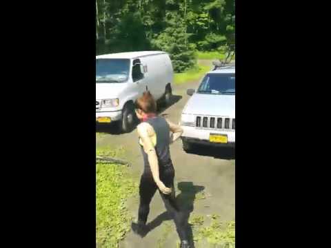 Girl puts on a dog shock collar and gets shocked